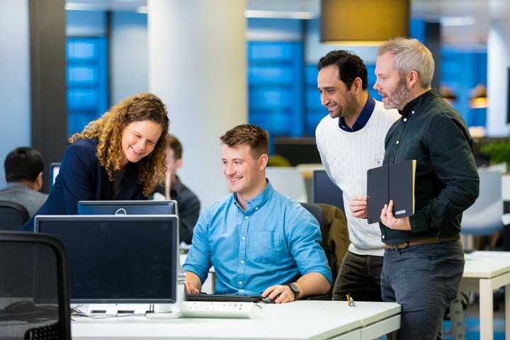 Group working at a computer