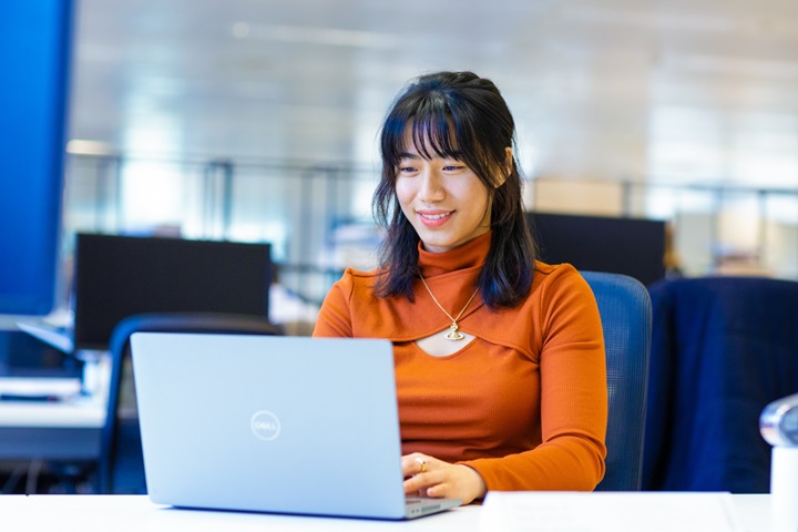 A lady working at her desk