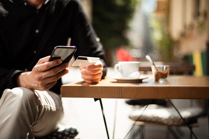 mature man with phone