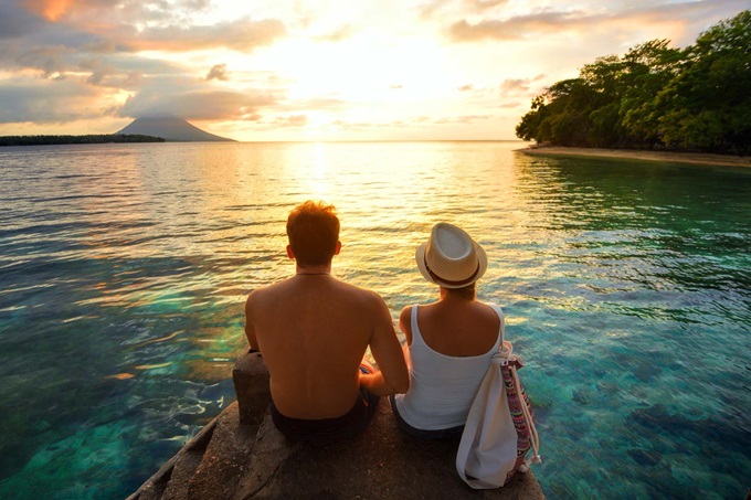 Couple looking out to sea