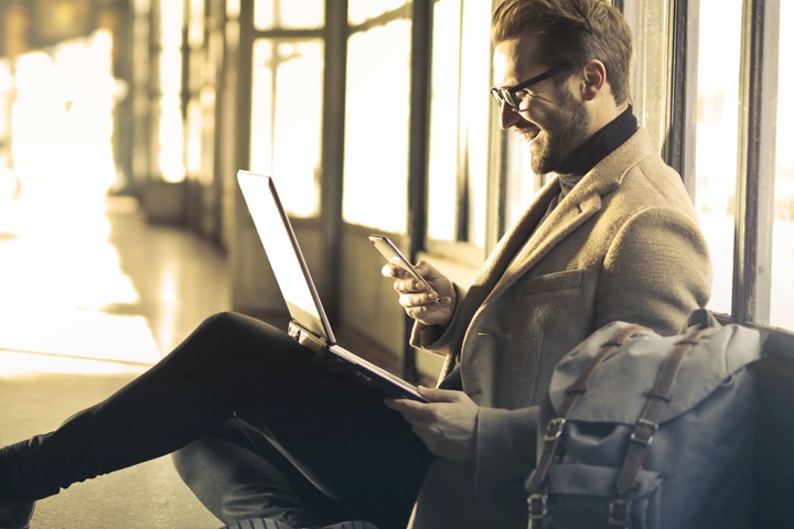 bearded man on laptop